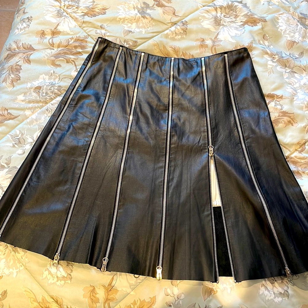 Vintage rocker mid length leather skirt.